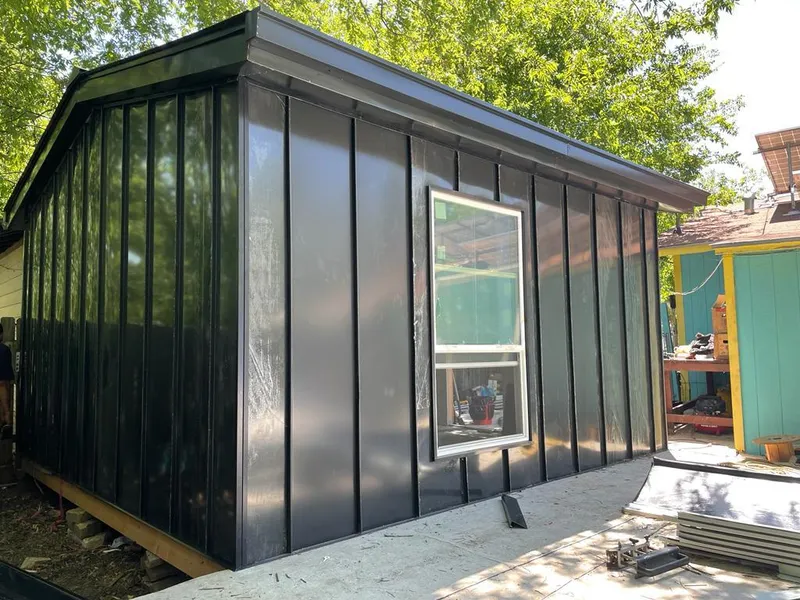 Black standing seam metal wall panels for Metal Roof Installation in Hudson